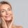 Woman with healthy radiant skin demonstrating skin longevity skincare results