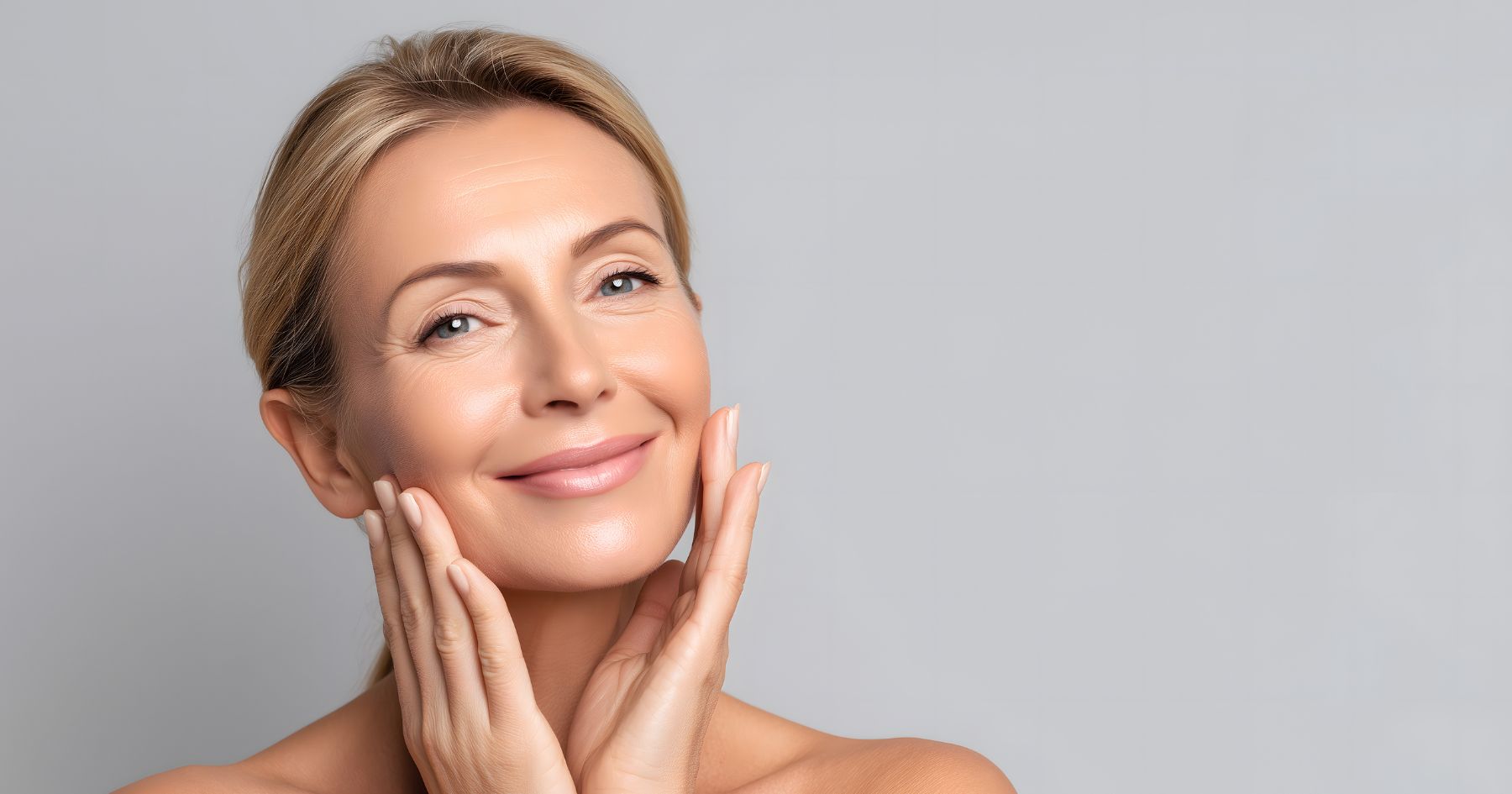 Woman with healthy radiant skin demonstrating skin longevity skincare results